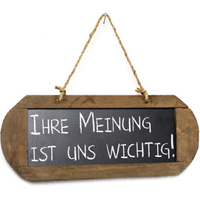 Tafel mit der Aufschrift "Ihre Meinung ist uns wichtig!"